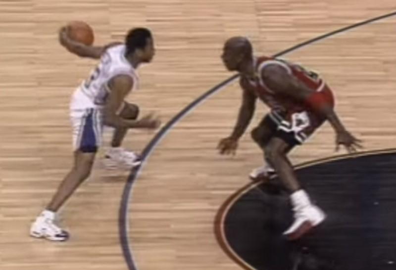 Allen Iverson crossing over Michael Jordan in 1997 wearing Reebok Question shoes