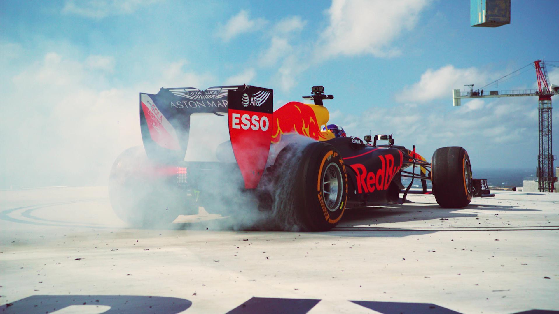 Red Bull F1 team reaches new heights with skyscraper burnout - Stream the Video