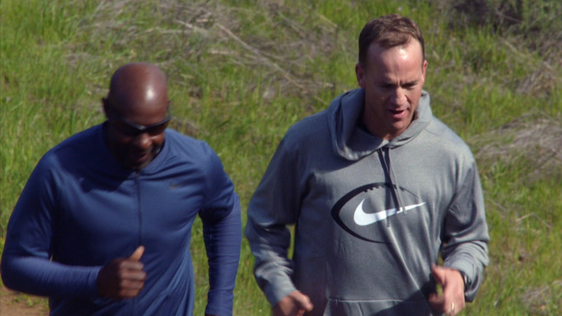 Manning runs Rice's hill with the legendary WR
