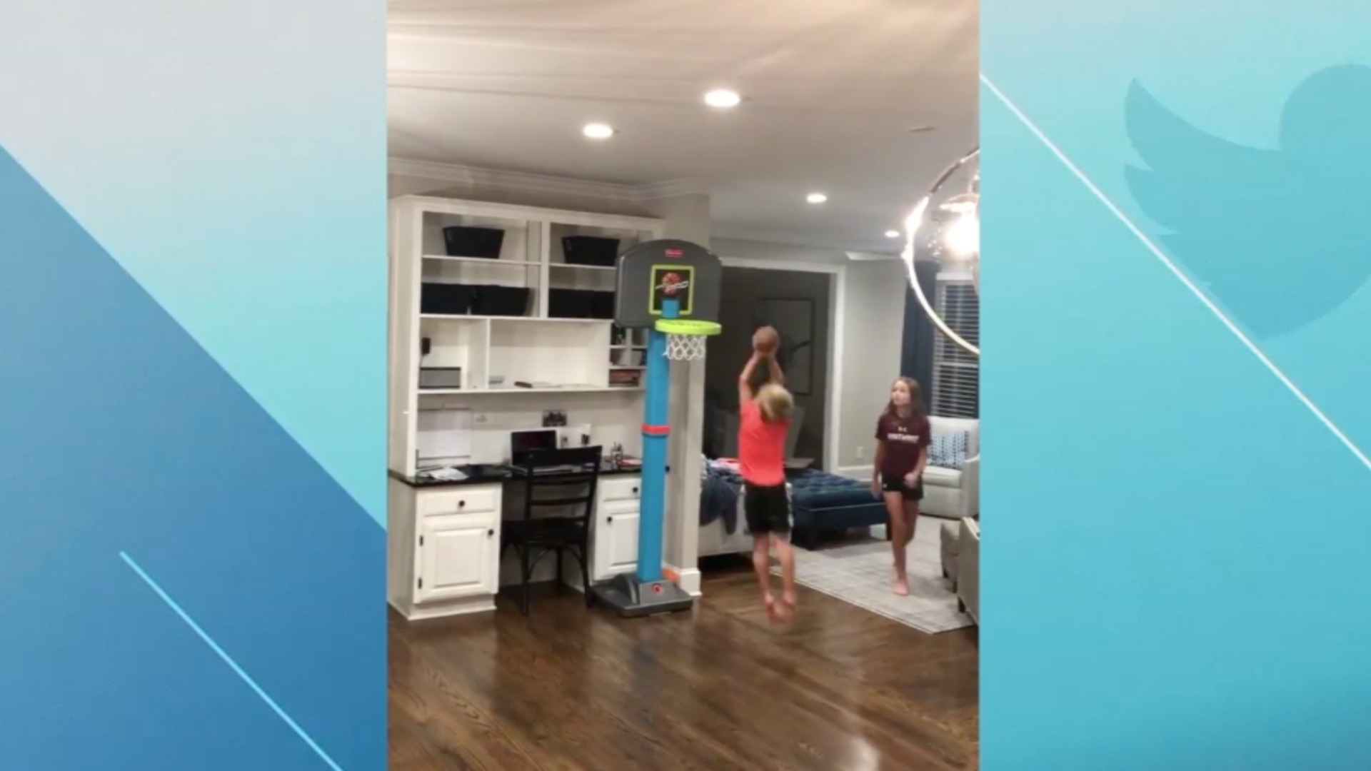 Winthrop's coach runs some drills in the kitchen with his family