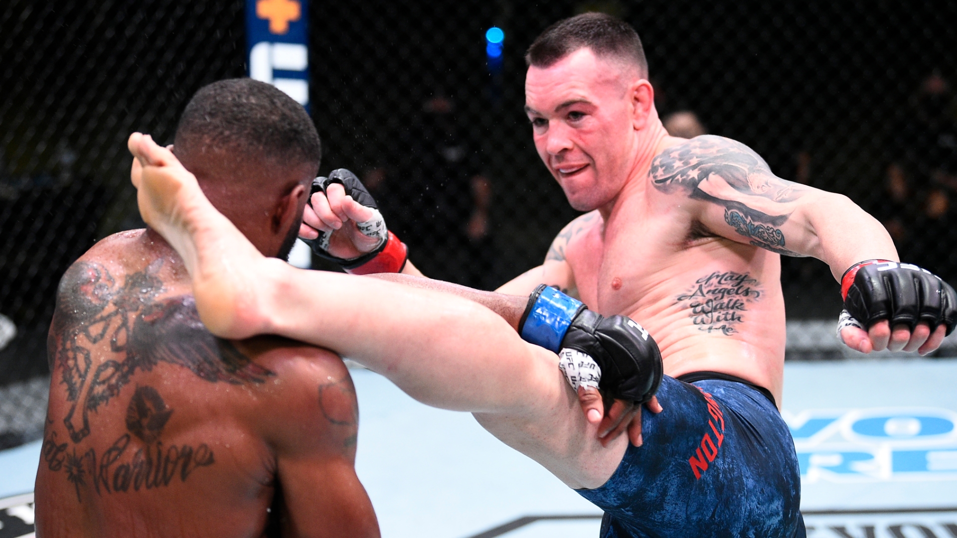 Covington keeps up pressure in main event vs. Woodley