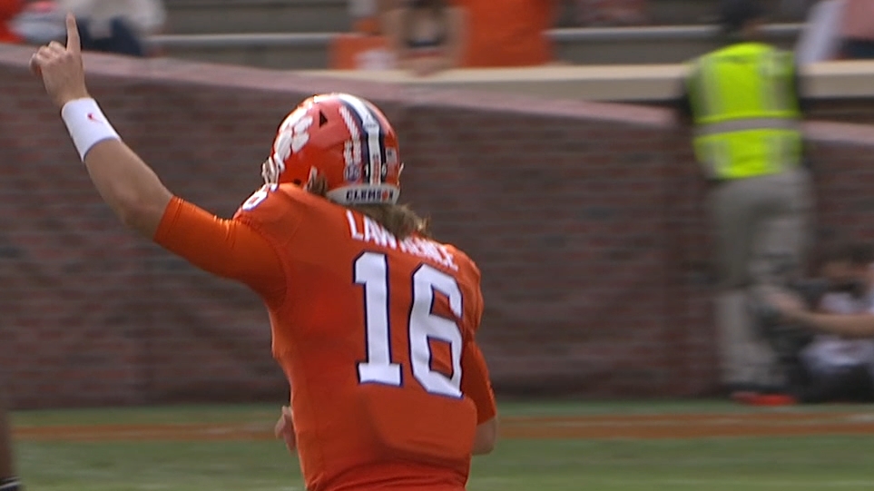 Lawrence tosses third TD of the first half