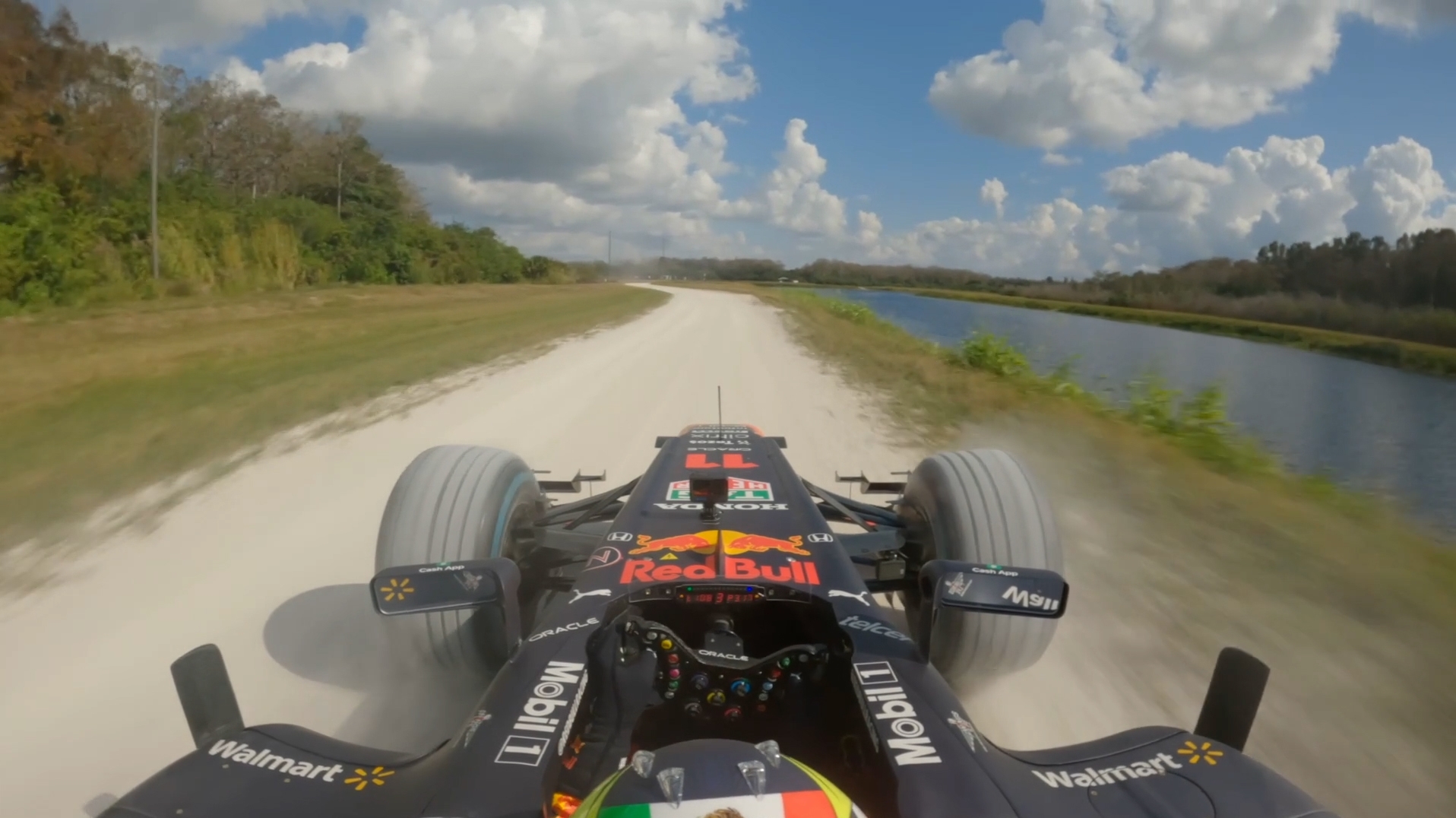 Perez drives his Red Bull on epic American road trip to Miami GP - Stream the Video