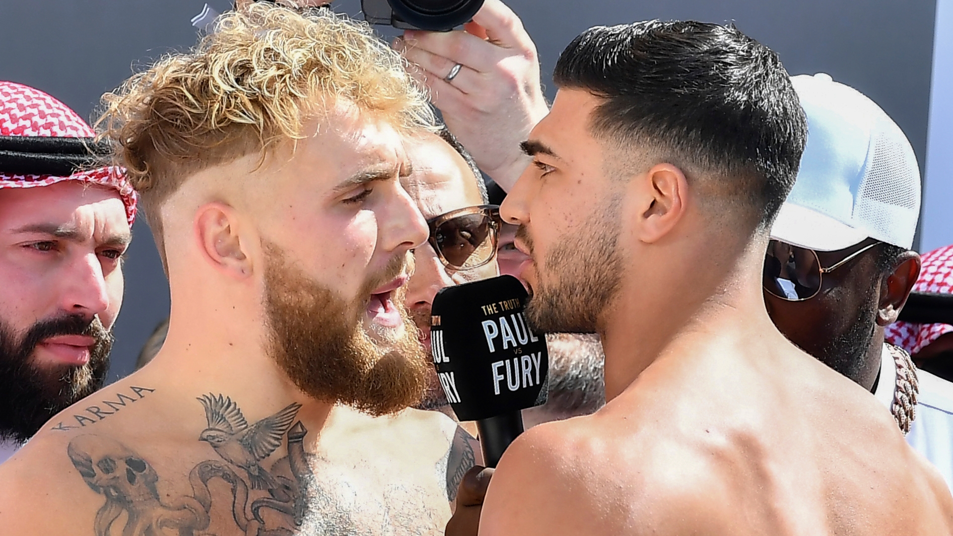Tommy Fury shoves Jake Paul as weigh-in gets heated - Stream the Video