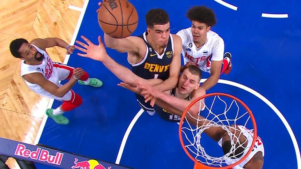 Michael Porter Jr. posterizes teammate Nikola Jokic on a putback jam