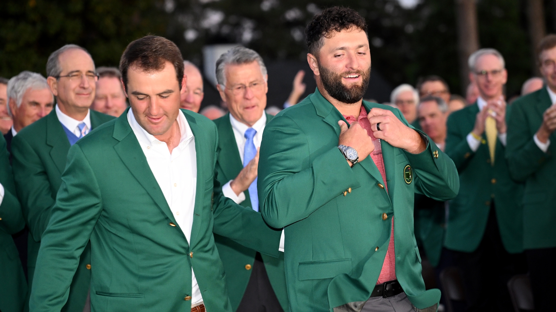 Scottie scheffler awards jon rahm with green jacket stream the video