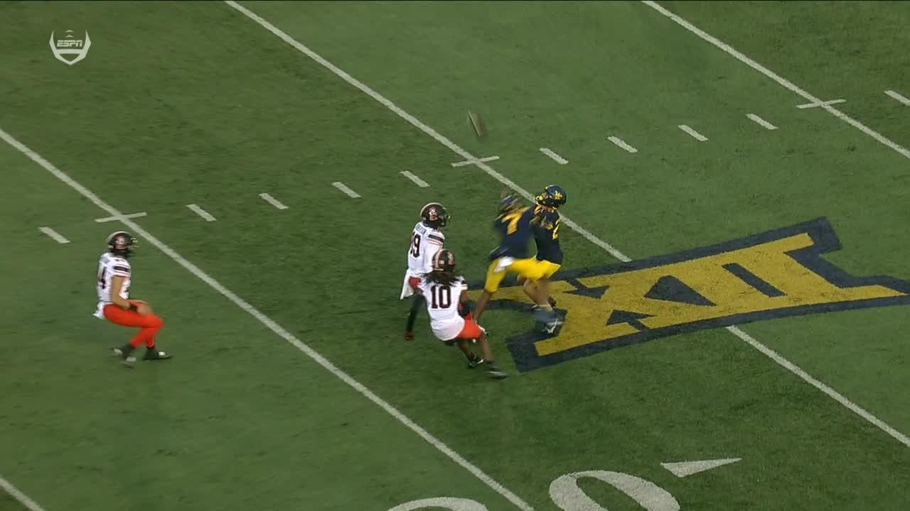 West Virginia player accidentally trucks his own teammate for fumble Stream the Video Watch ESPN