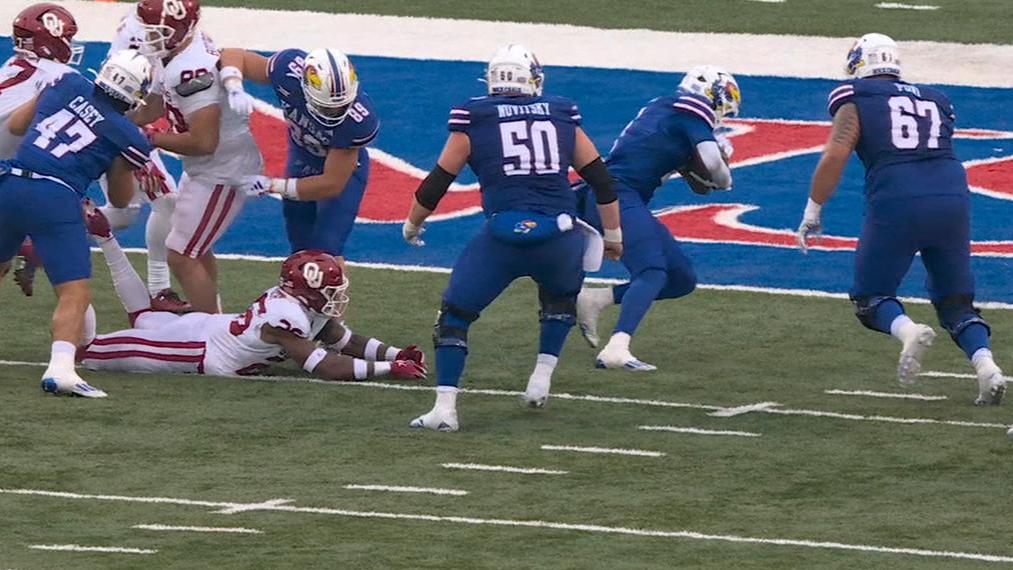 Kansas converts on 4th down, scores late to upset No. 6 Oklahoma