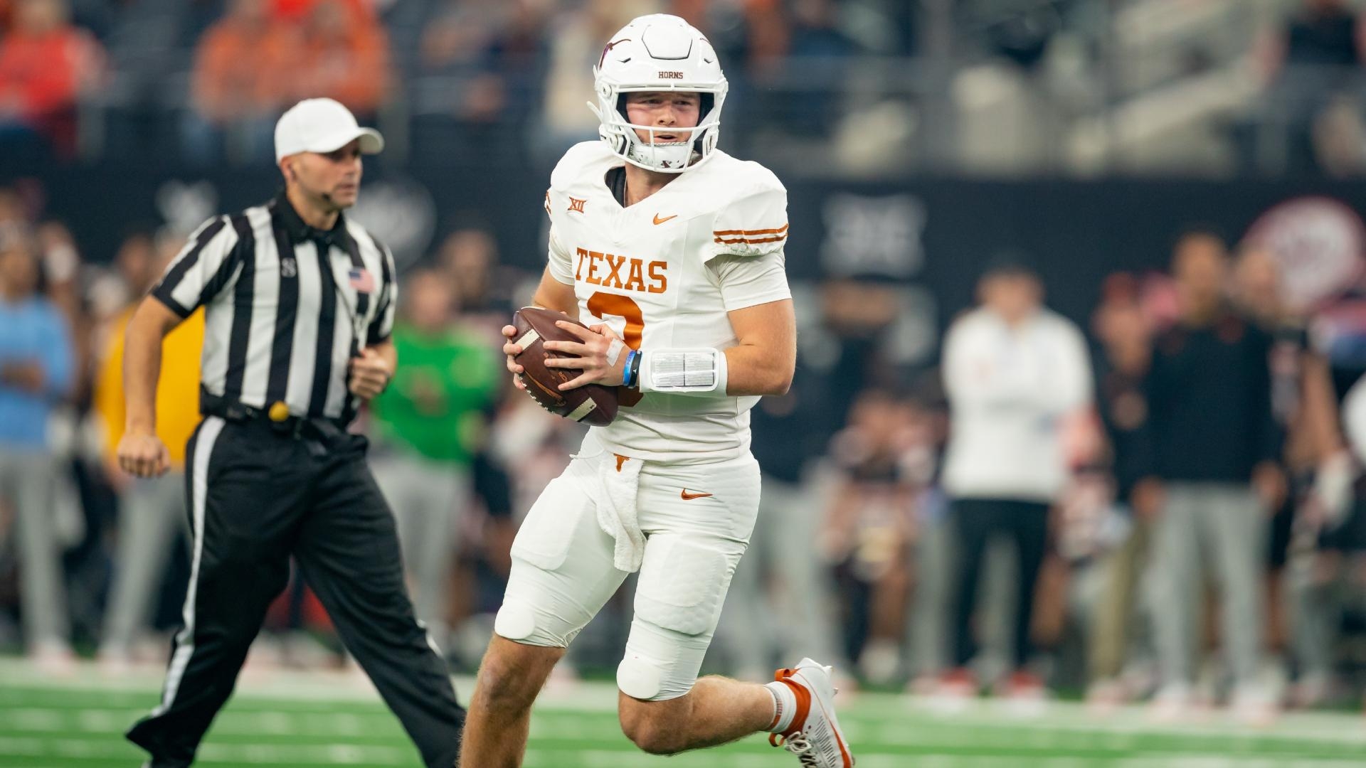 Quinn Ewers shines with 4 first-half TDs in Big 12 title game