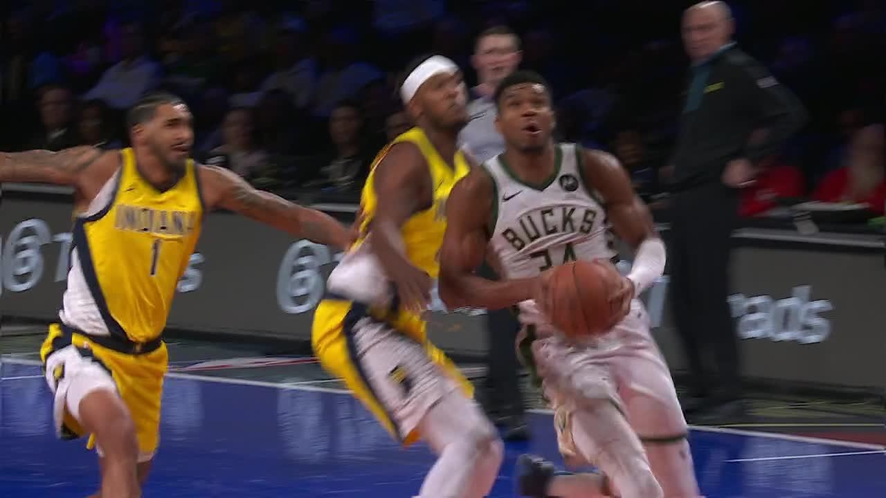 Giannis goes downhill for the massive one-handed slam