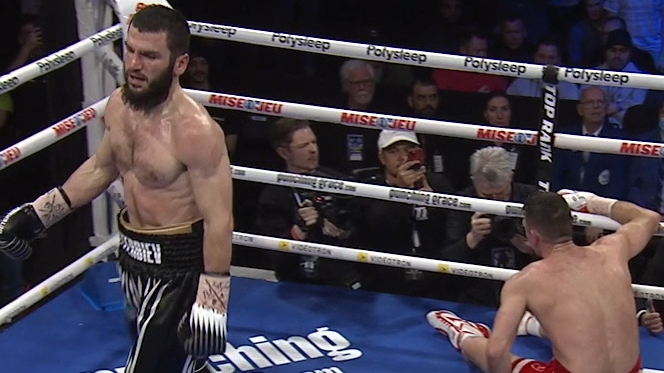Artur Beterbiev claims victory after Callum Smith's corner stops fight