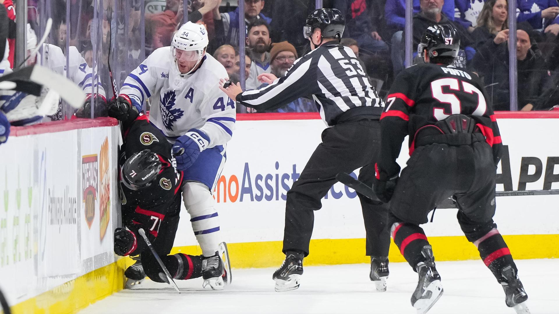 Rielly cross-checks Greig for hammering slap shot into empty net ...