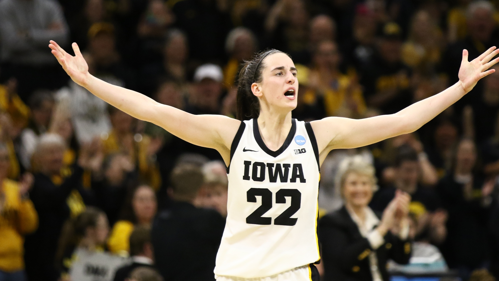 Iowa holds off West Virginia in a nail-biter to reach Sweet 16