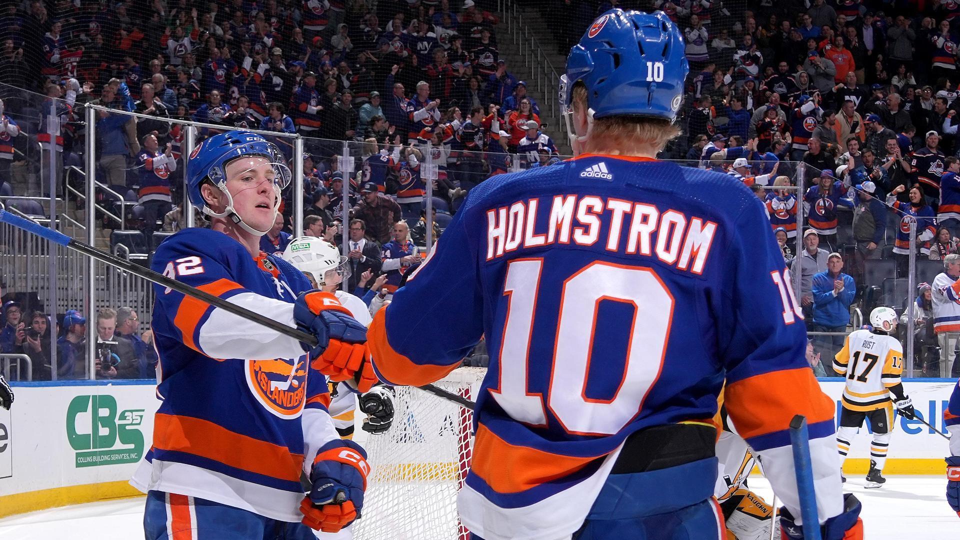 Simon Holmstrom roofs the winning goal for the Islanders