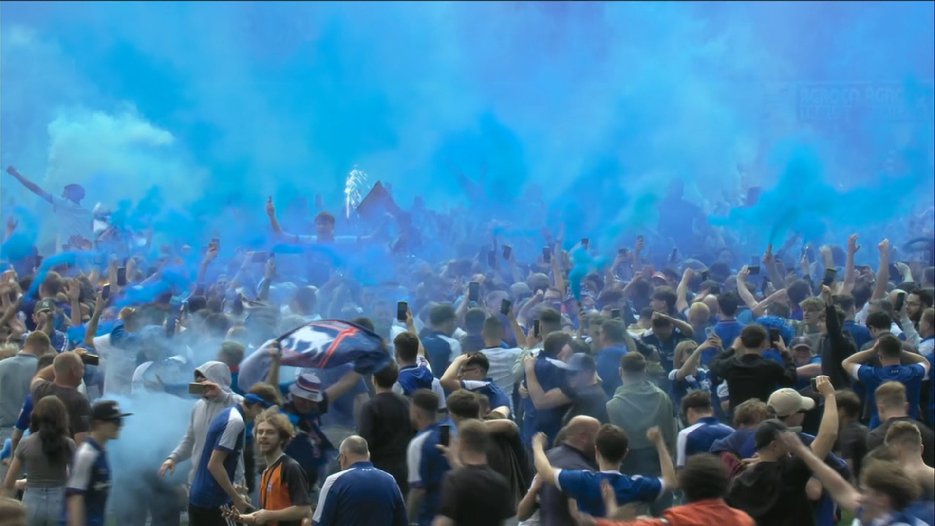 Ipswich fans storm the pitch to celebrate Premier League return