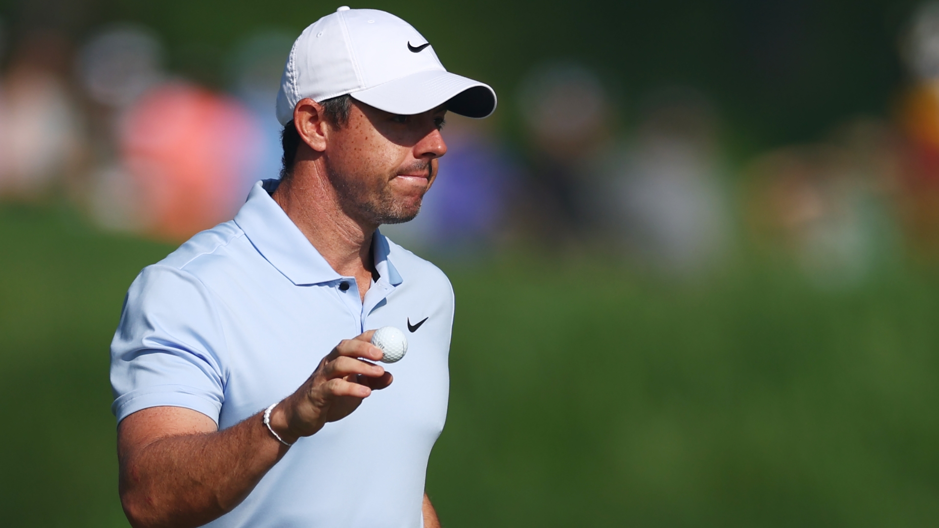 Rory McIlroy fist-bumps after chipping in for birdie