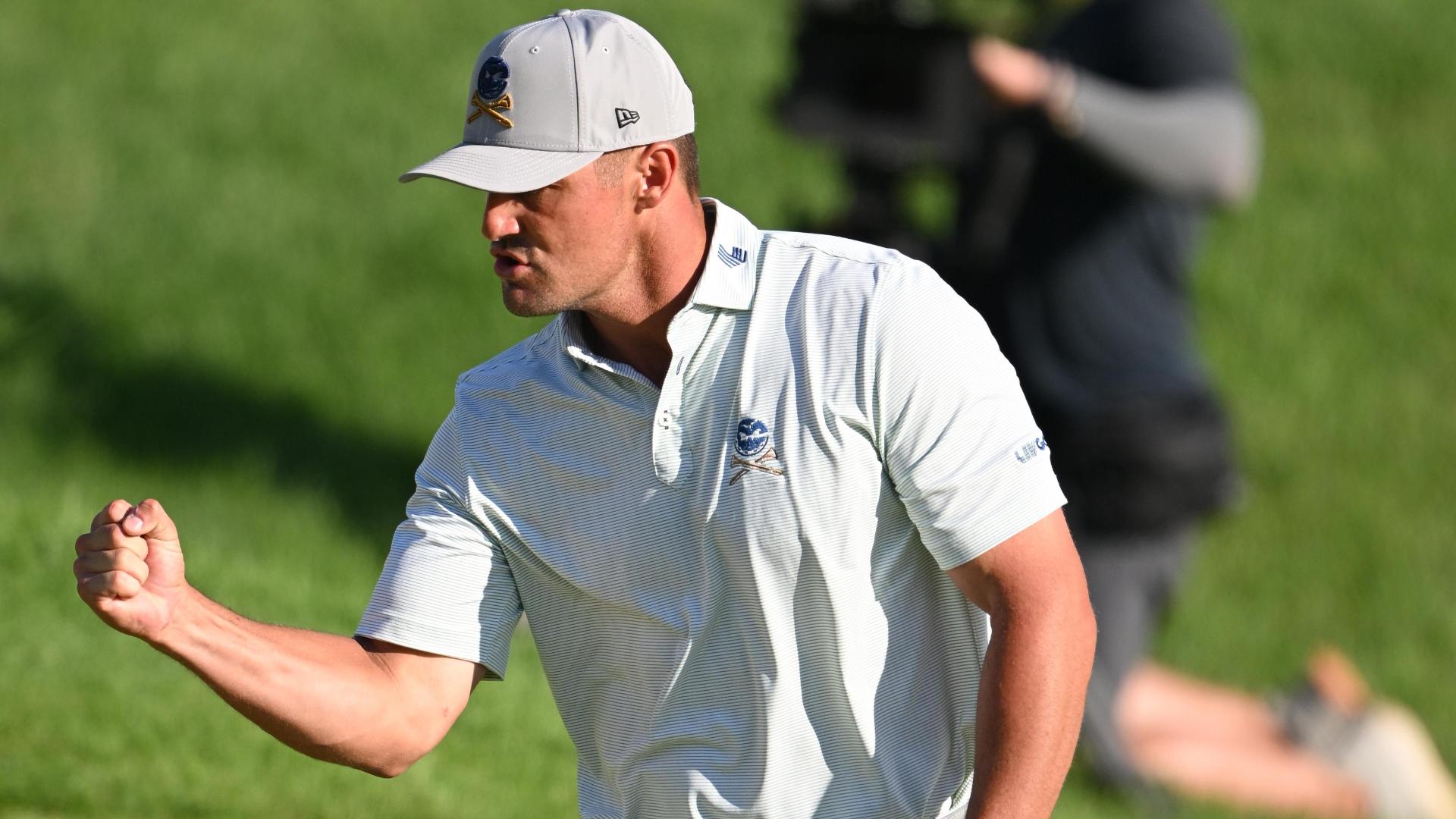 Bryson DeChambeau chips in for eagle, climbs to one back of the lead