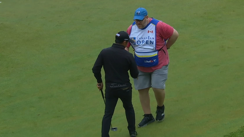 C.T. Pan has a fan caddie for a couple of holes