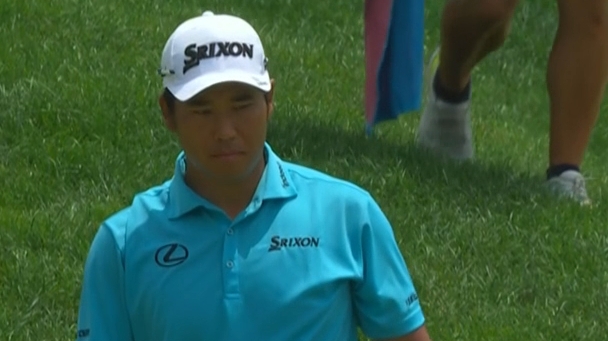 Hideki Matsuyama holes it from a tough angle in the rough