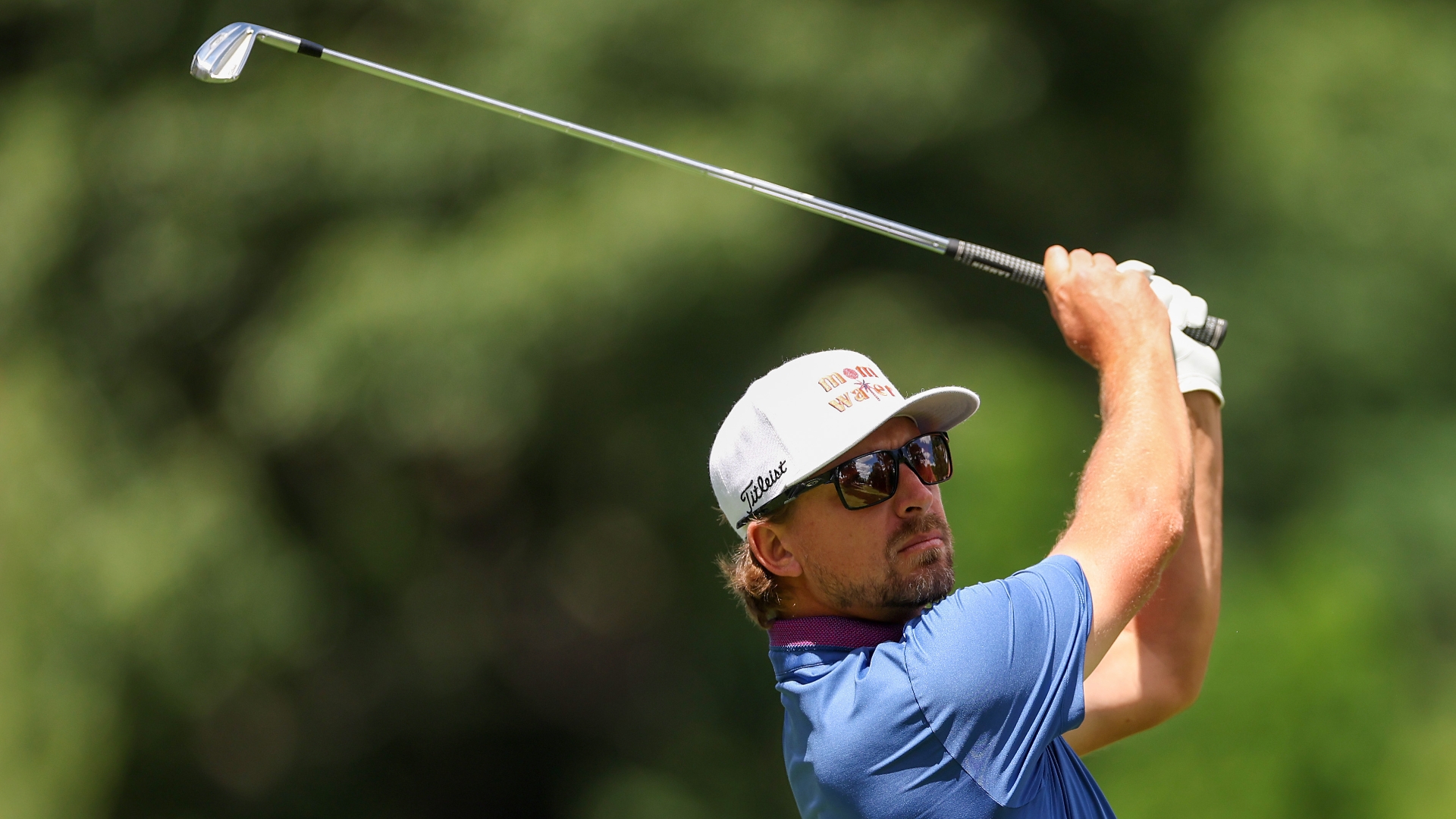 Roger Sloan holes out from the fairway for eagle