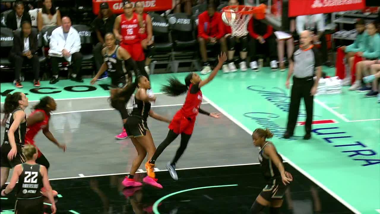 Jordin Canada drives and drains a bucket for the Dream