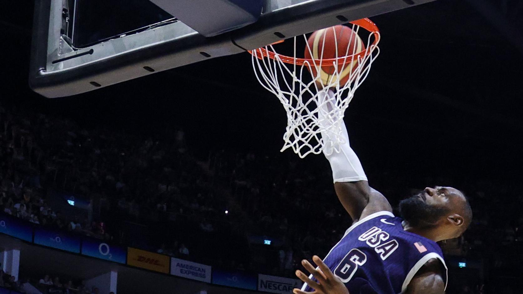 LeBron rattles rim with vicious one-handed slam for Team USA