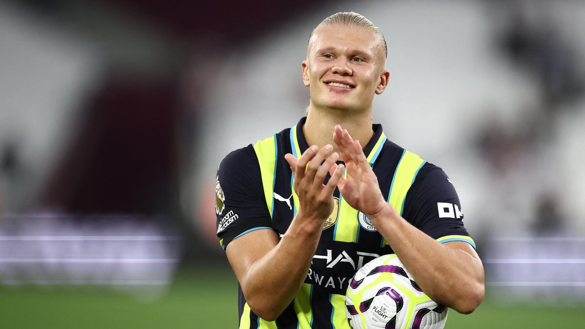 Erling Haaland with the match ball after his hat-trick against West Ham.