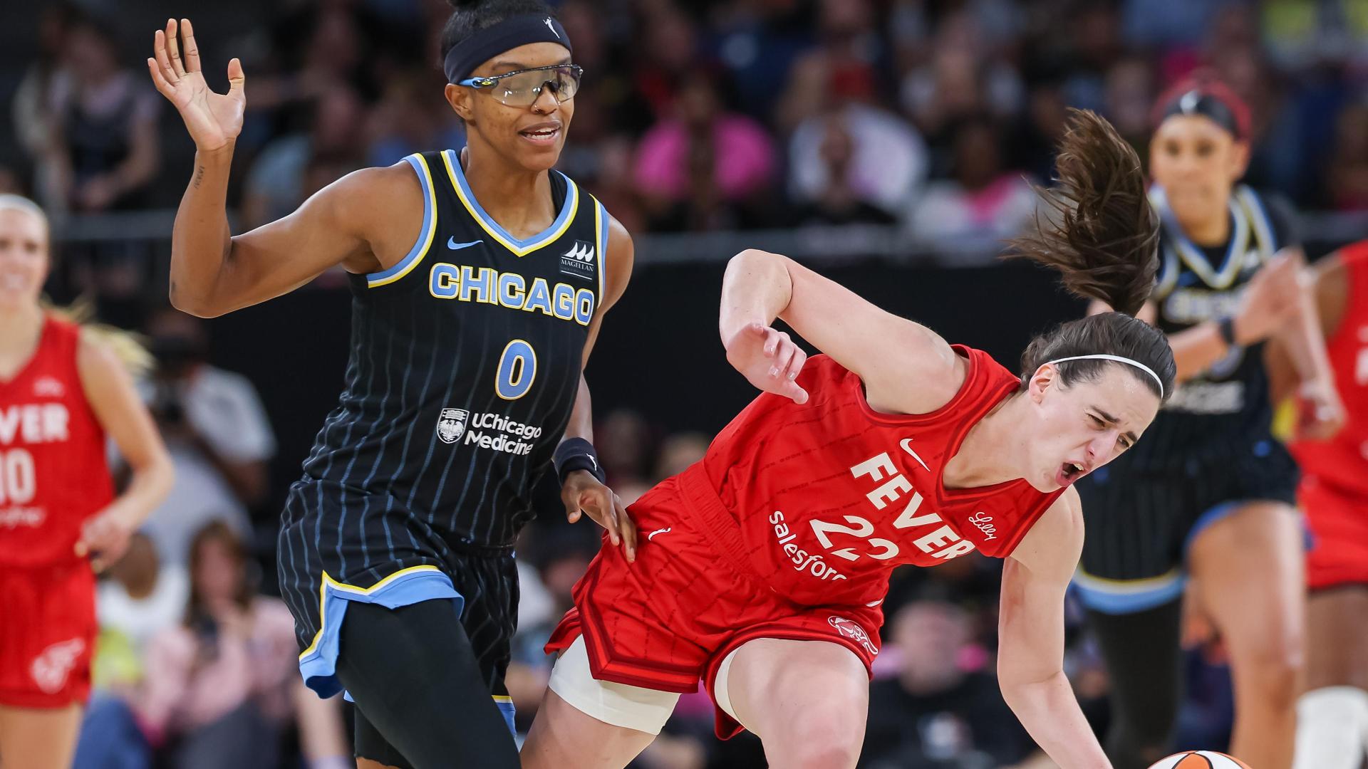 Caitlin Clark knocked to court on flagrant foul by Diamond DeShields