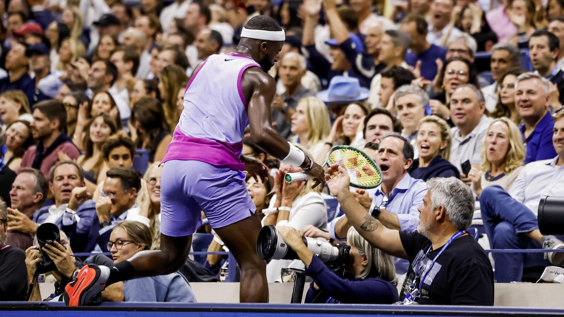 Tiafoe ends up in photographer's booth after electric rally