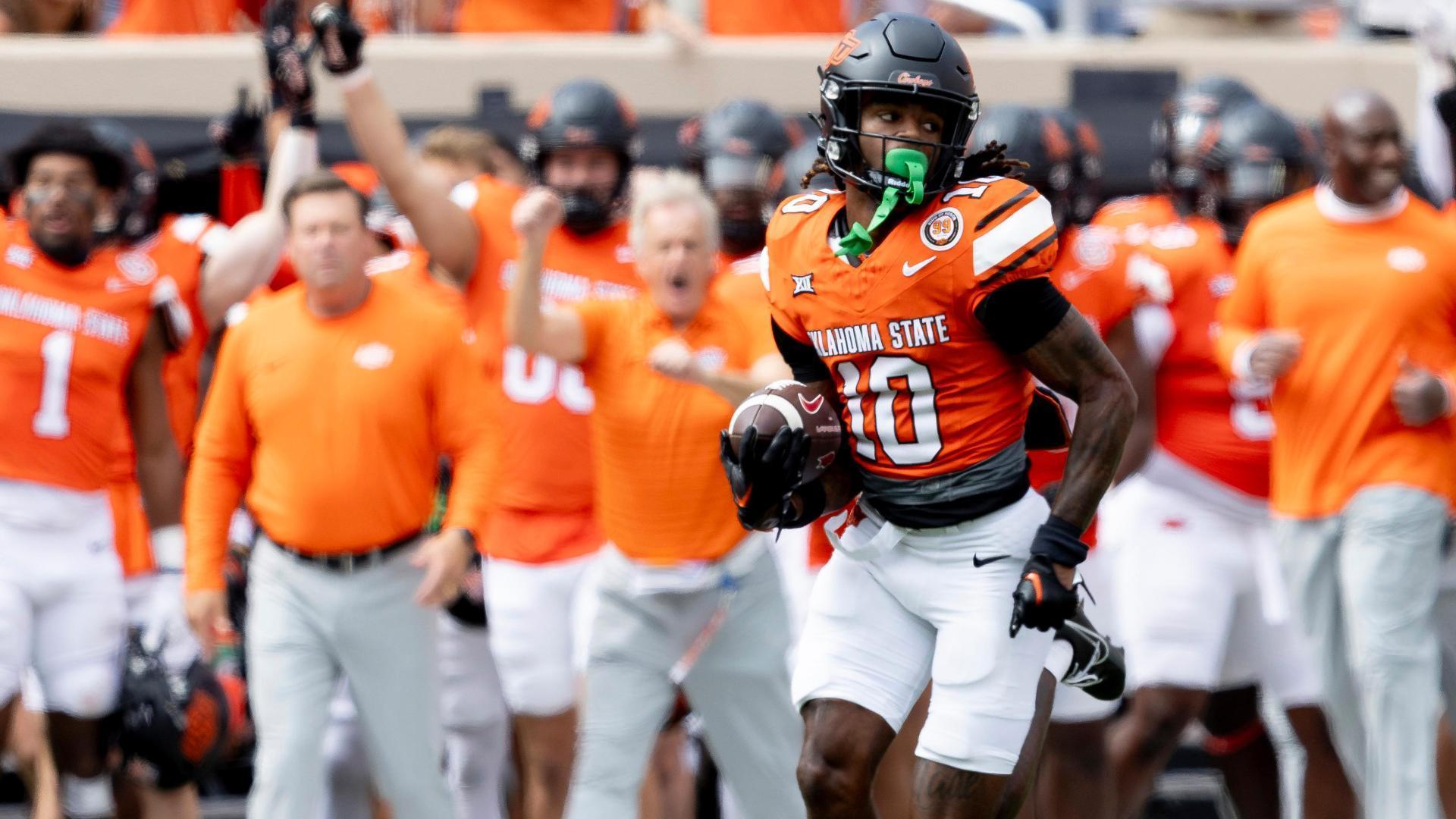 Pick-six! Oklahoma State's Kale Smith takes it 73 yards to the house