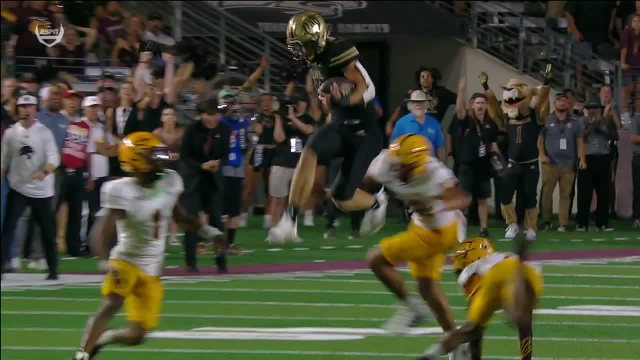 Texas State's Joey Hobert hurdles defender on 4th down