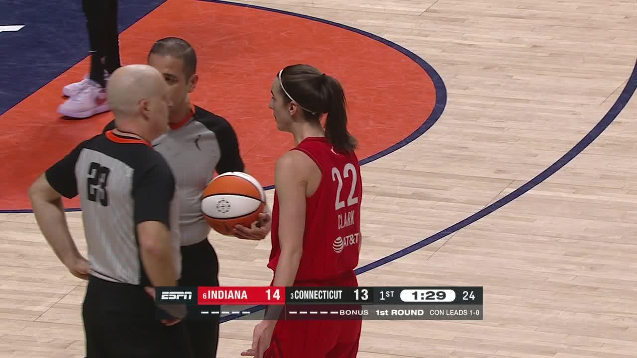 Security gets involved with a fan pointed out by Caitlin Clark