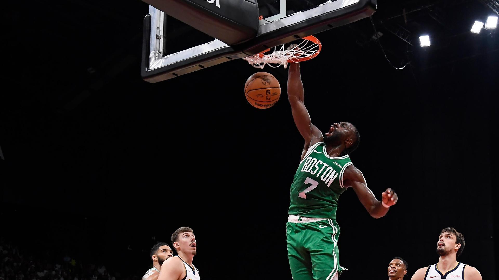 Jaylen Brown gets up for a big slam