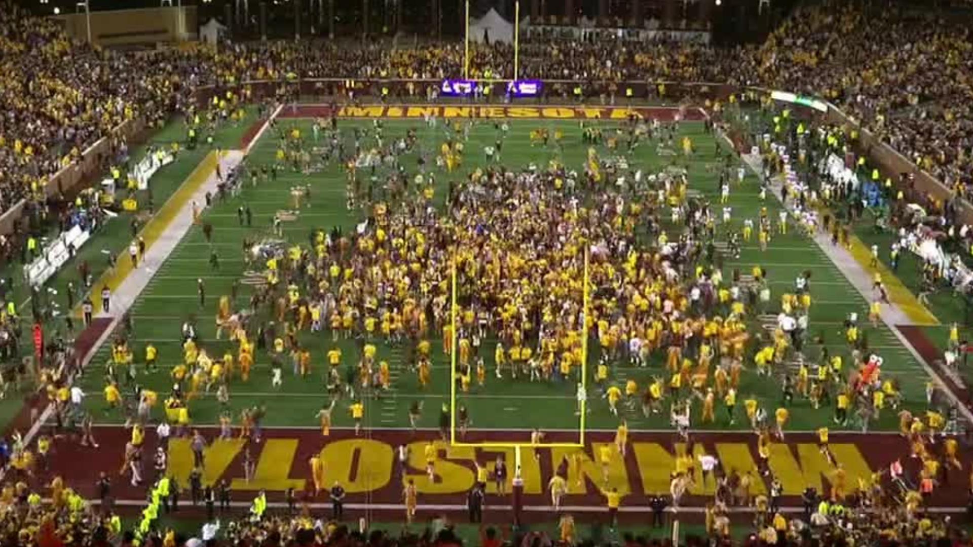 Minnesota fans storm the field after upset win over No. 11 USC