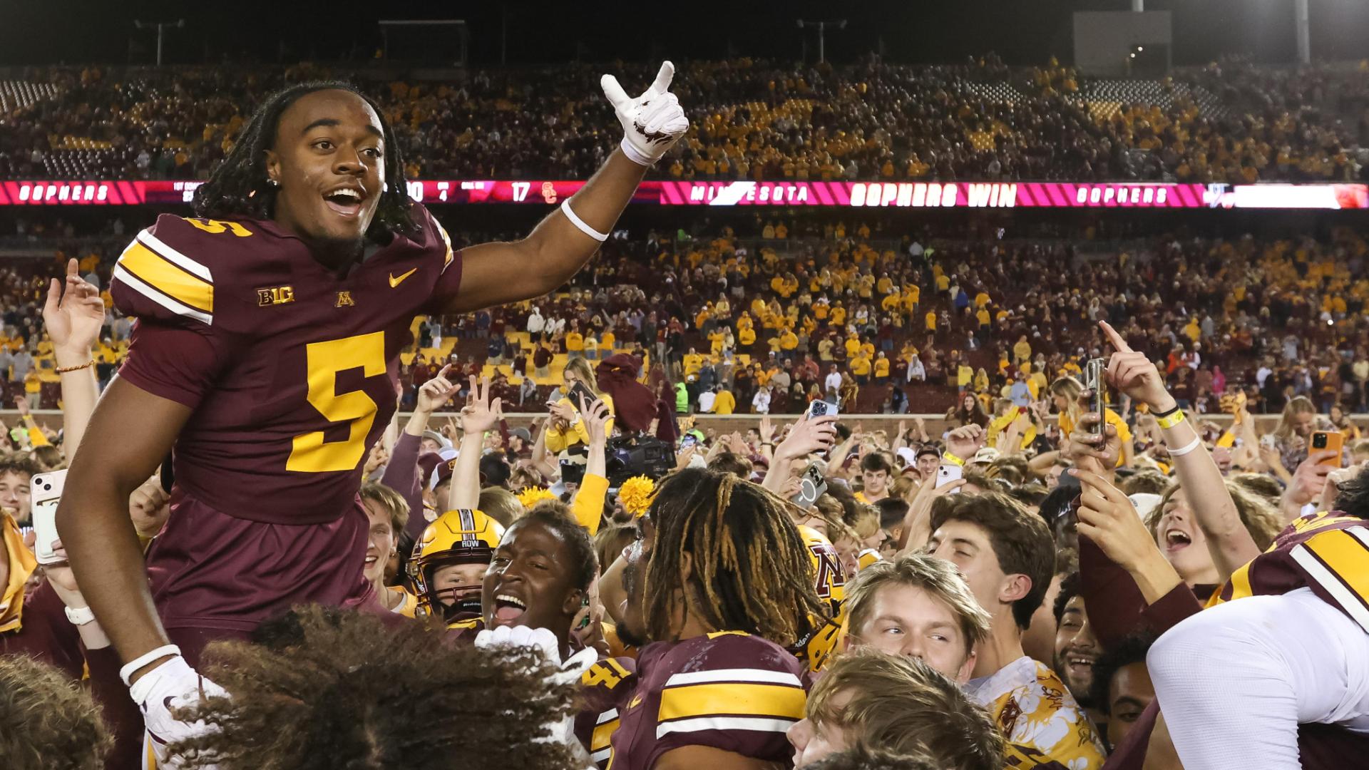 Minnesota fans storm the field after upset win over No. 11 USC