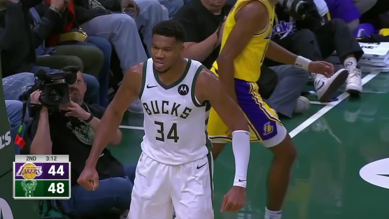 Dame finds Giannis for big throw-down