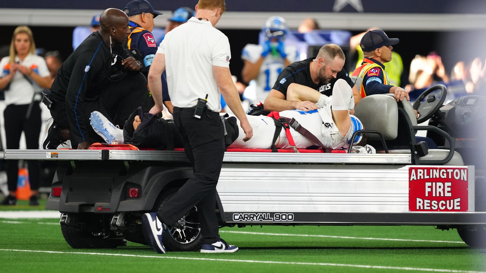 Aidan Hutchinson carted off after suffering leg injury in 3rd quarter