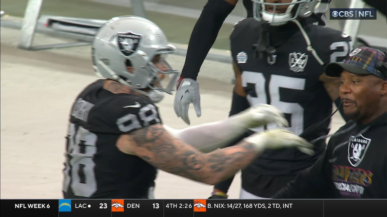 Maxx Crosby shoves Raiders coach after a sack