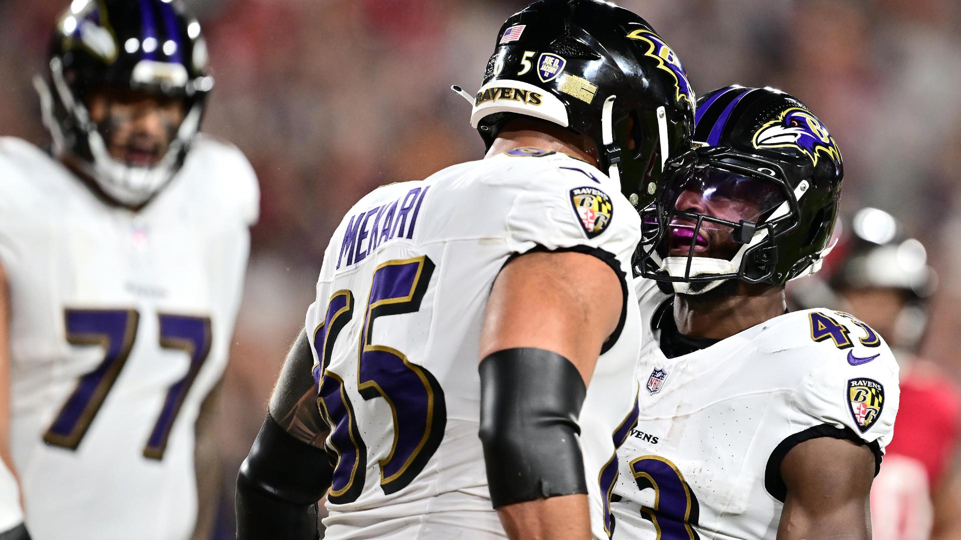 Justice Hill speeds into the end zone off a screen from Lamar Jackson