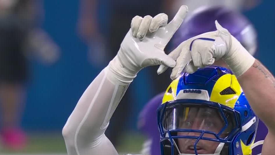 Michael Hoecht throws up the 'L.A.' sign after a huge sack