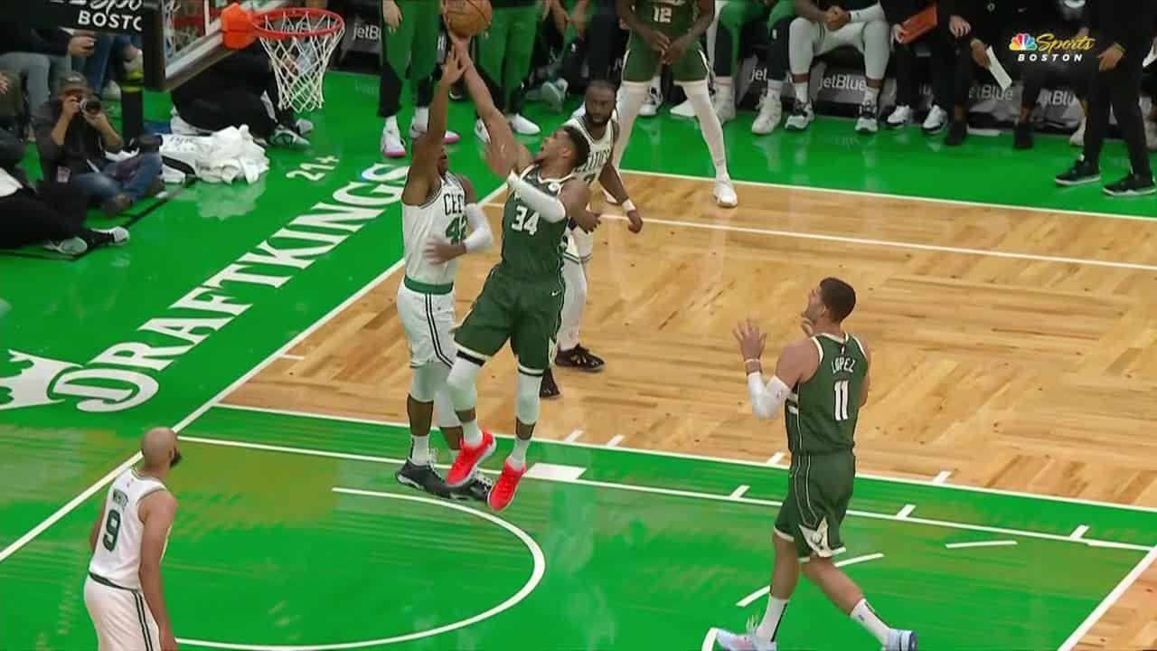 Giannis slashes and floats in a beauty of a finger roll