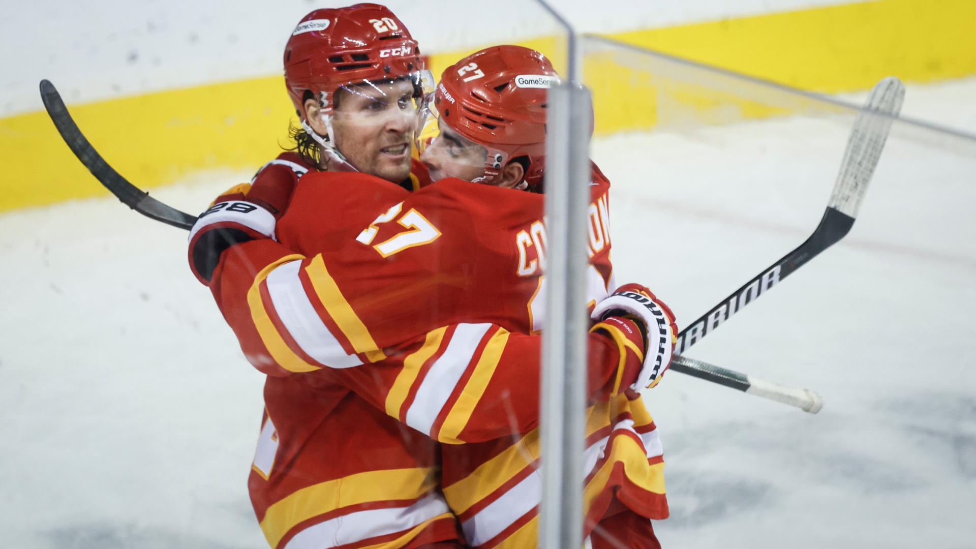 Flames catch fire with 2 third-period goals in just 28 seconds