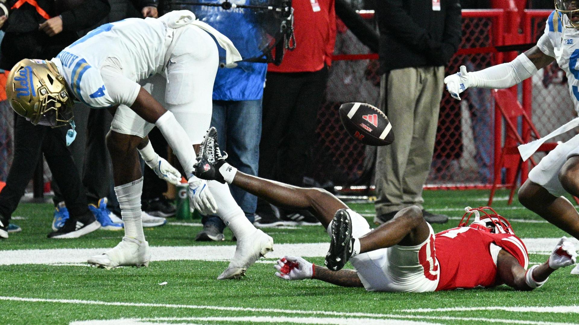 UCLA clinches win with INT that takes wild bounce