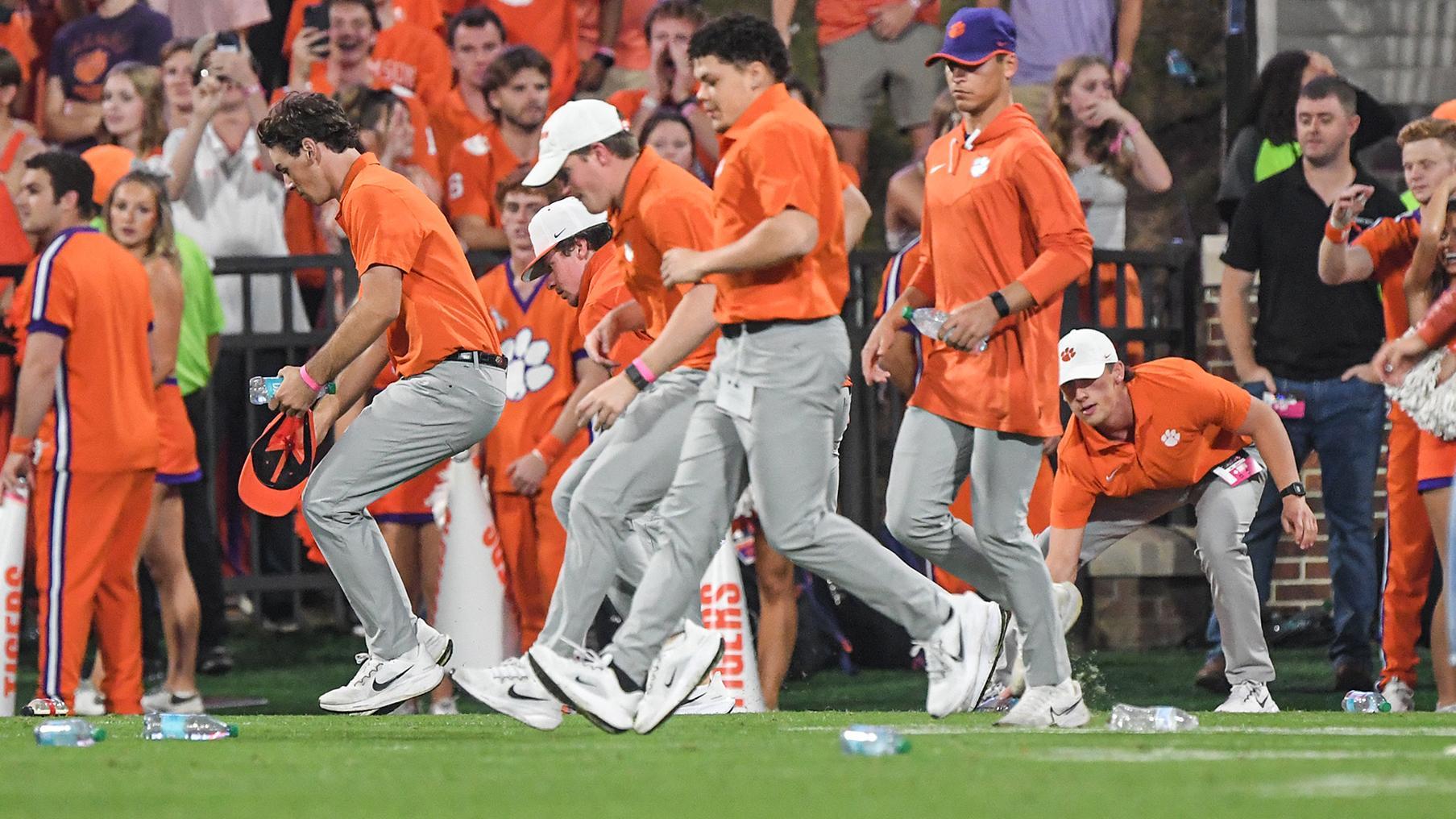 Unhappy Clemson fans throw water bottles onto field