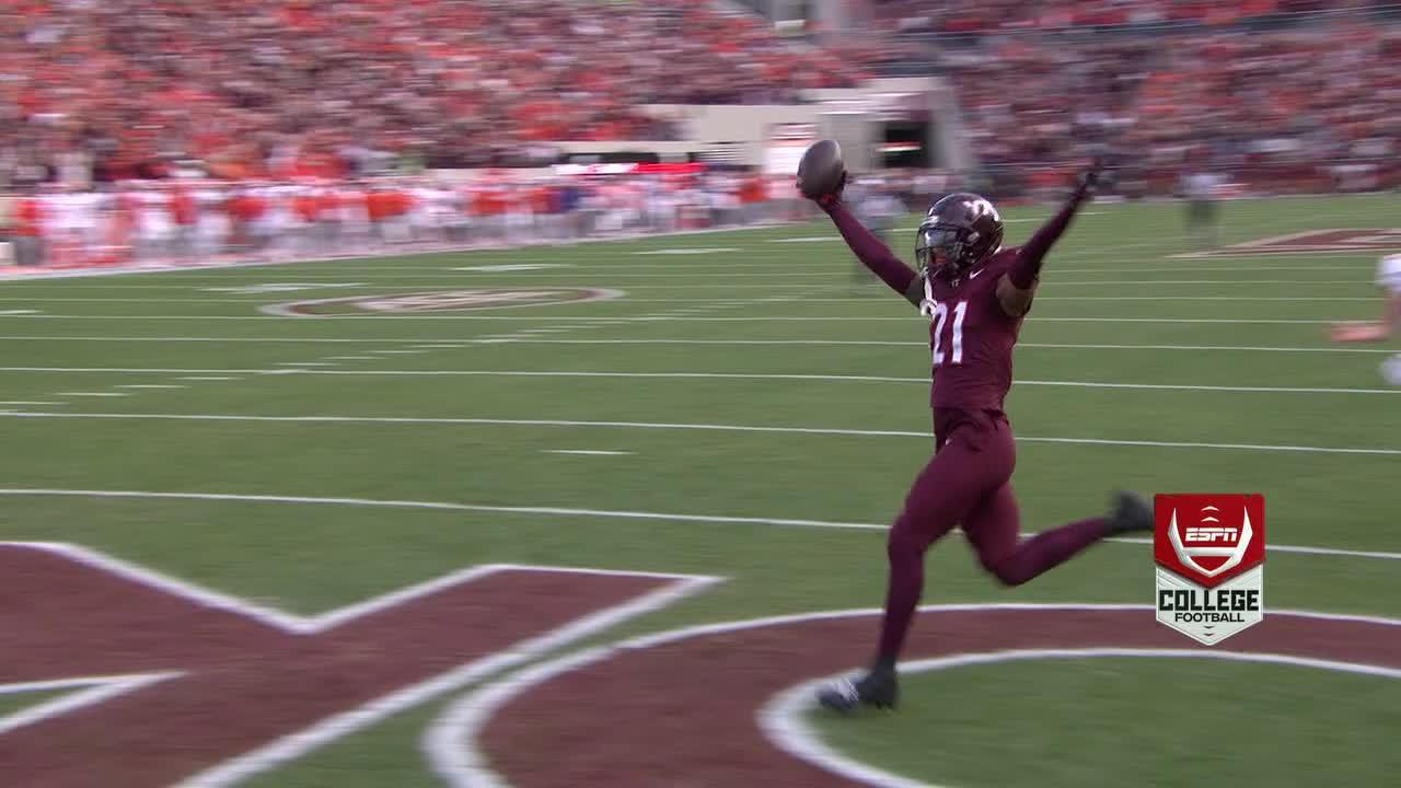 Virginia Tech blocks a kick and runs it back for a TD