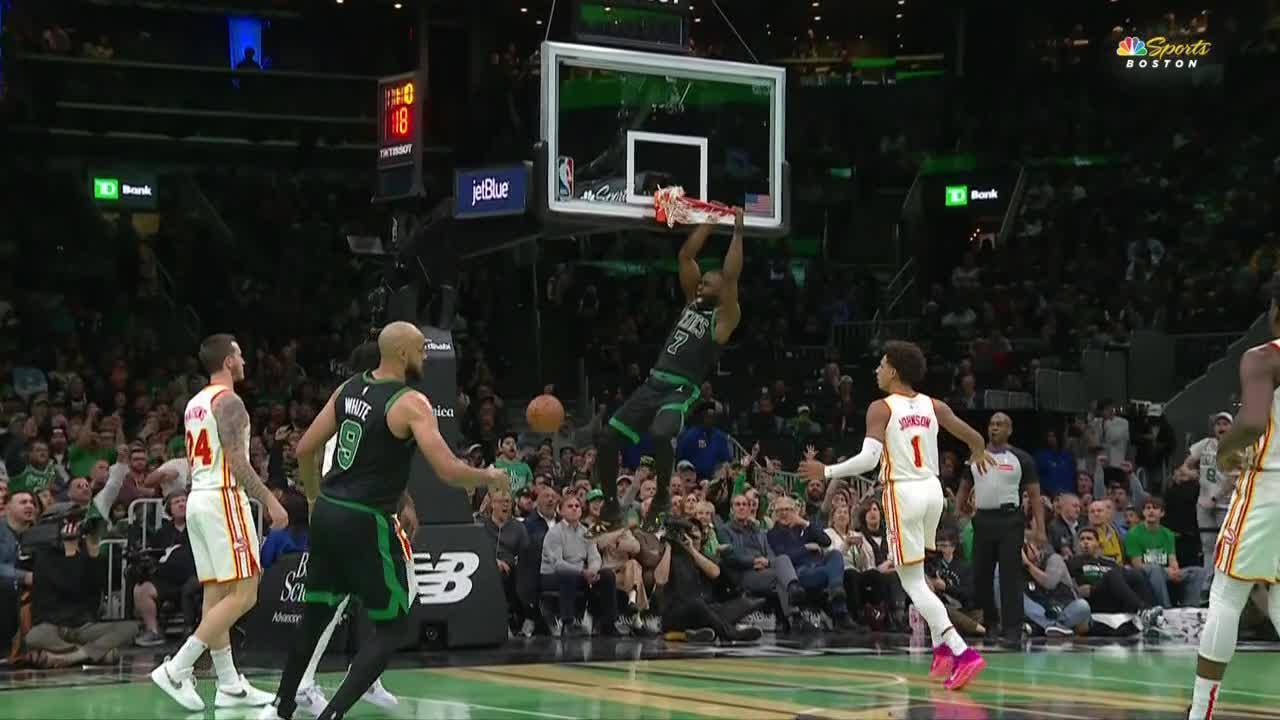 Jaylen Brown rises high for the fast-break alley-oop