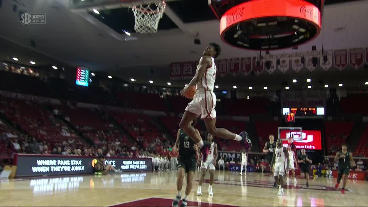 Jalon Moore's windmill dunk pads Oklahoma's lead