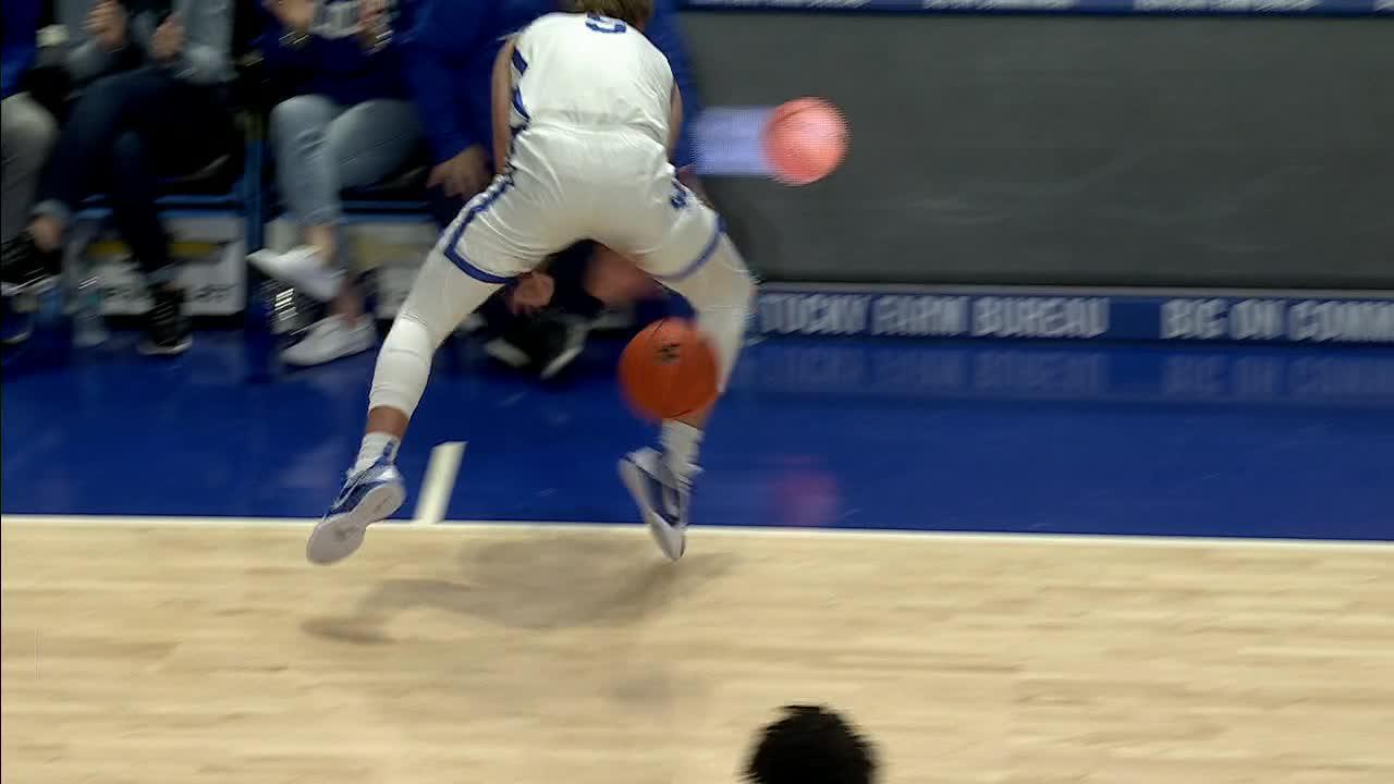 Kentucky's Collin Chandler hikes ball between legs for unusual assist