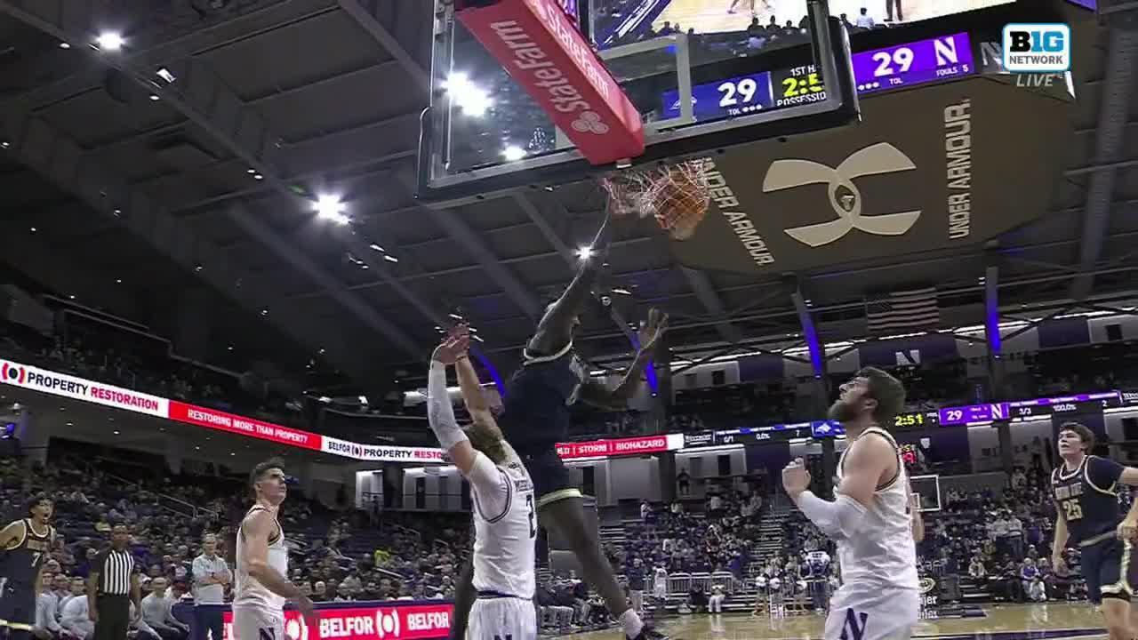 BJ Kolly slams home the inbounds alley-oop