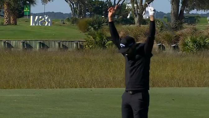 Adam Hadwin holes out for eagle from the fairway